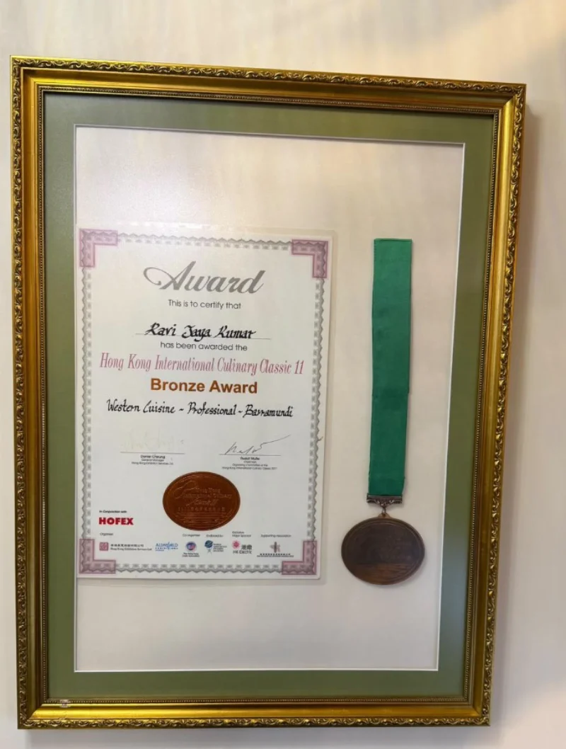The framed HOFEX 2011 bronze award certificate and medal presented to Chef Ravi Jaya Kumar