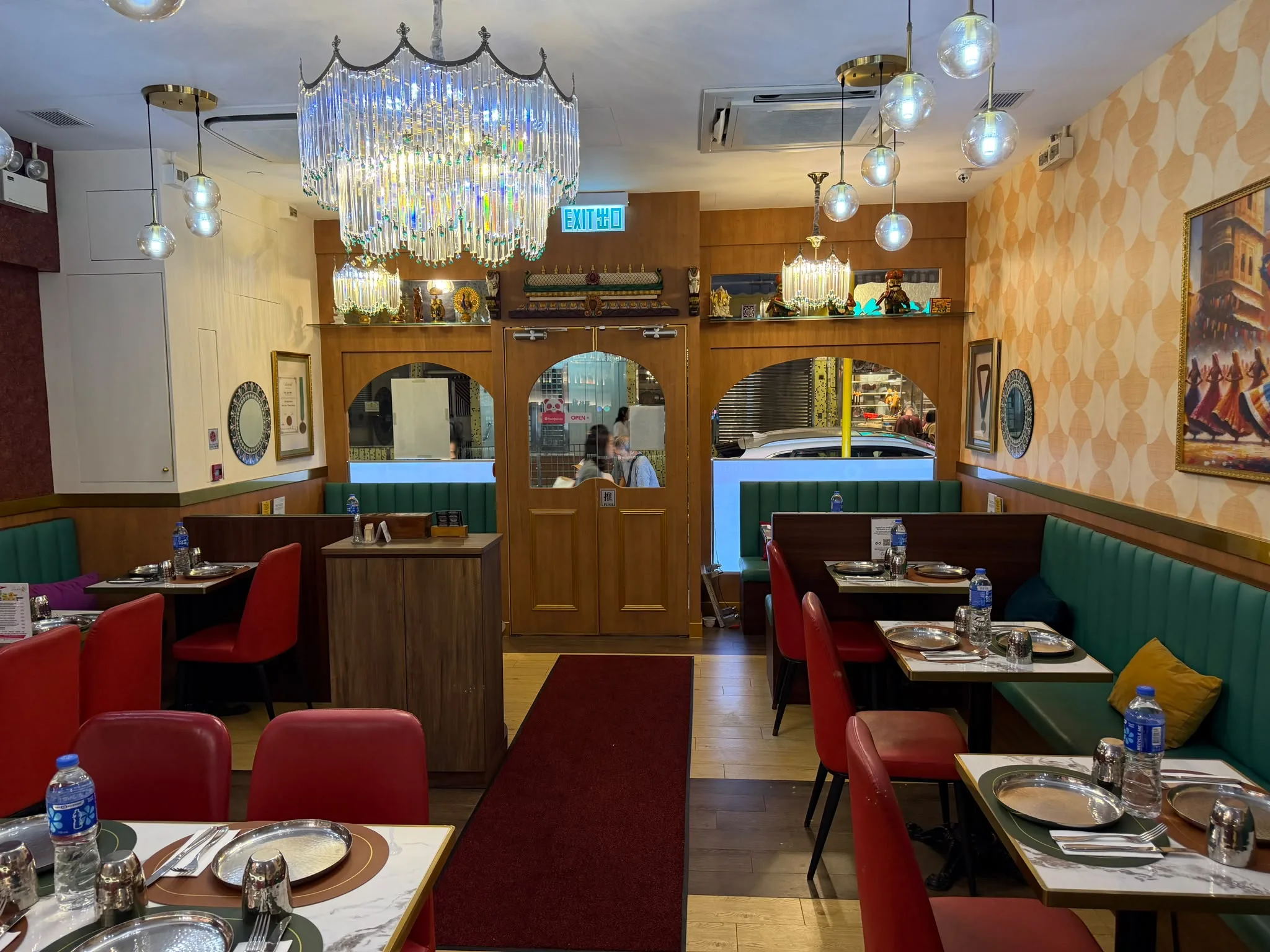 The Tulsi dining room under its chandeliers